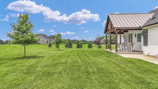 619 County Road 2550 N, Dewey, IL 61840 - view of grassy yard with a patio area