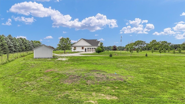 619 County Road 2550 N, Dewey, IL 61840 - view of yard featuring a shed and gravel driveway