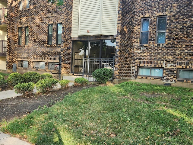 2149 Country Club Dr Unit 16, Woodridge, IL 60517 - entrance to property with brick siding and a lawn