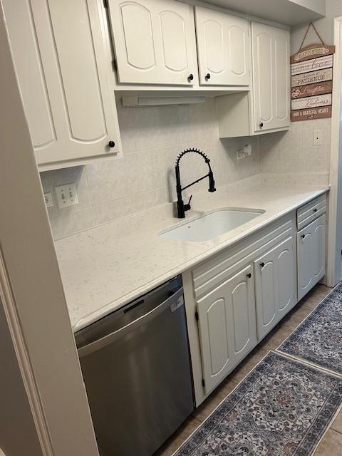 2149 Country Club Dr Unit 16, Woodridge, IL 60517 - kitchen with dishwasher, backsplash, and light countertops