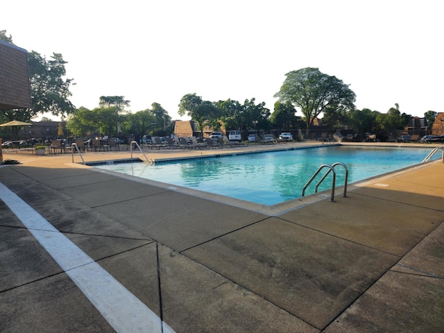2149 Country Club Dr Unit 16, Woodridge, IL 60517 - community pool featuring a patio