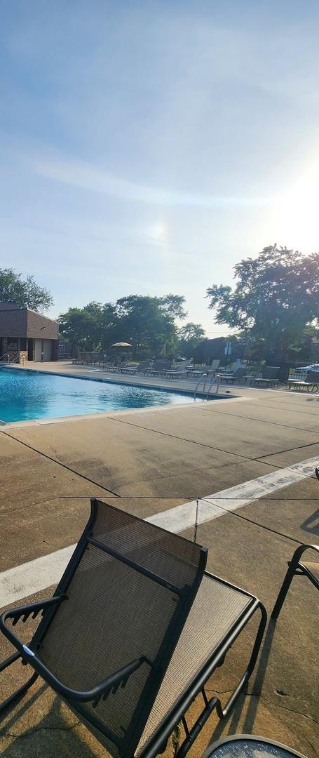 2149 Country Club Dr Unit 16, Woodridge, IL 60517 - community pool with a patio area
