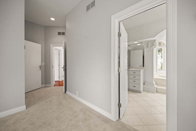 W3318 Lake Forest Ln, Lake Geneva, WI 53147 - hall with ornate columns, recessed lighting, and light colored carpet