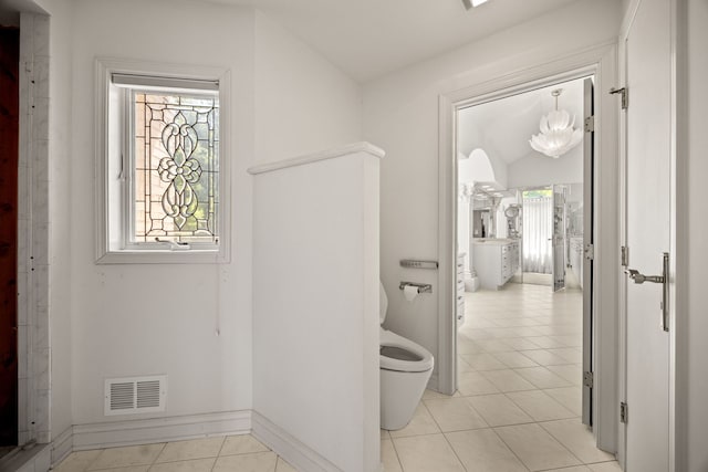 W3318 Lake Forest Ln, Lake Geneva, WI 53147 - bathroom featuring tile patterned floors and a chandelier