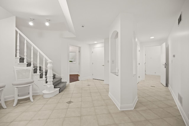 W3318 Lake Forest Ln, Lake Geneva, WI 53147 - foyer featuring stairway and recessed lighting