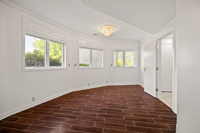 W3318 Lake Forest Ln, Lake Geneva, WI 53147 - spare room with wood tiled floors and ornamental molding