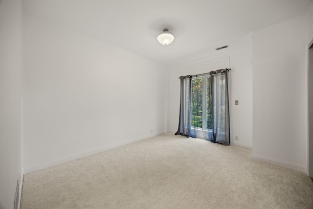 W3318 Lake Forest Ln, Lake Geneva, WI 53147 - unfurnished room with light colored carpet and baseboards