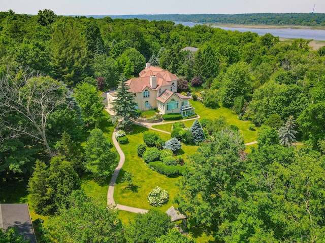 W3318 Lake Forest Ln, Lake Geneva, WI 53147 - view of subject property featuring a heavily wooded area and a nearby body of water