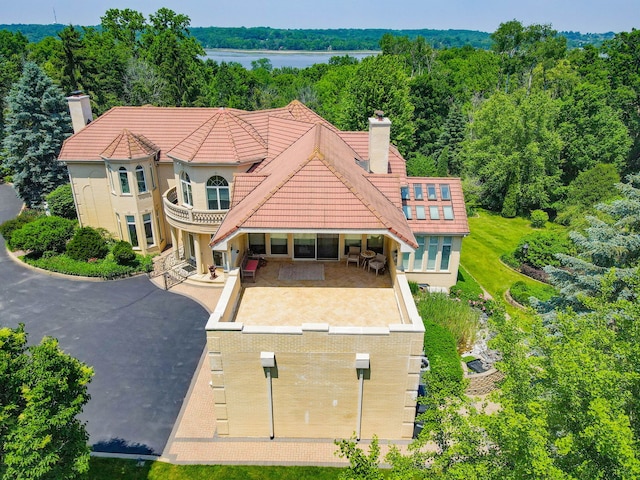 W3318 Lake Forest Ln, Lake Geneva, WI 53147 - view of subject property featuring a large body of water and a heavily wooded area
