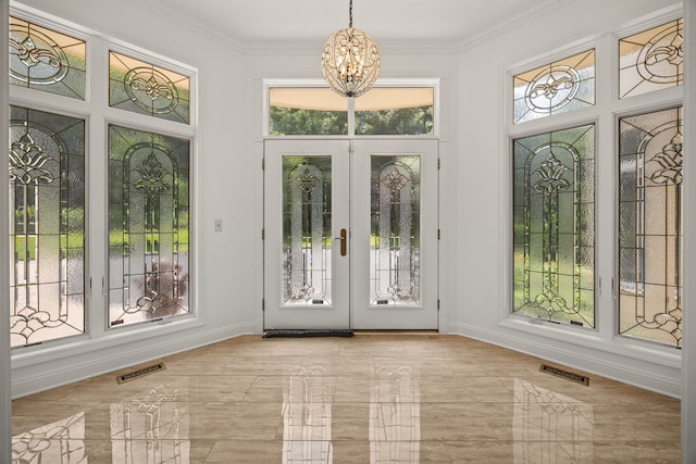 W3318 Lake Forest Ln, Lake Geneva, WI 53147 - unfurnished sunroom featuring french doors and a chandelier