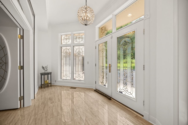 W3318 Lake Forest Ln, Lake Geneva, WI 53147 - entrance foyer with a chandelier and a towering ceiling