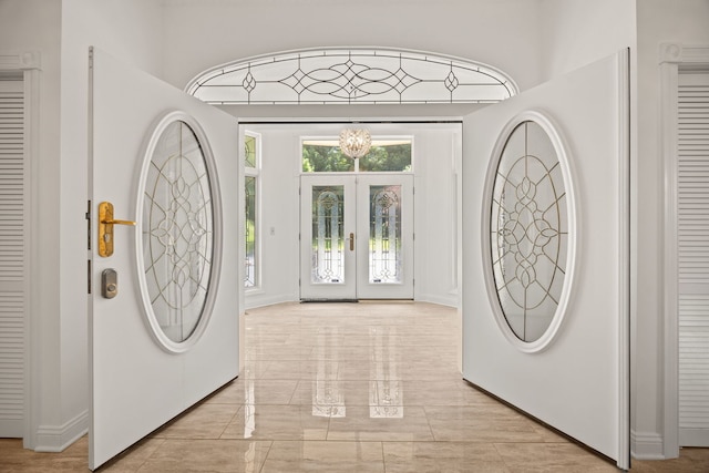 W3318 Lake Forest Ln, Lake Geneva, WI 53147 - foyer with french doors and baseboards