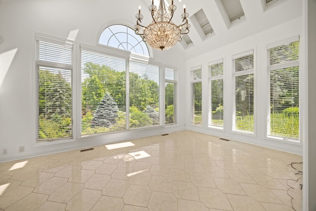 W3318 Lake Forest Ln, Lake Geneva, WI 53147 - unfurnished sunroom featuring beam ceiling, a chandelier, and a high ceiling