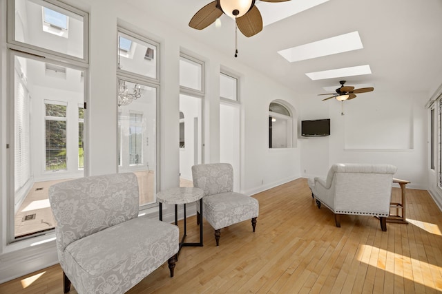 W3318 Lake Forest Ln, Lake Geneva, WI 53147 - living area with ceiling fan, light wood-type flooring, and a skylight