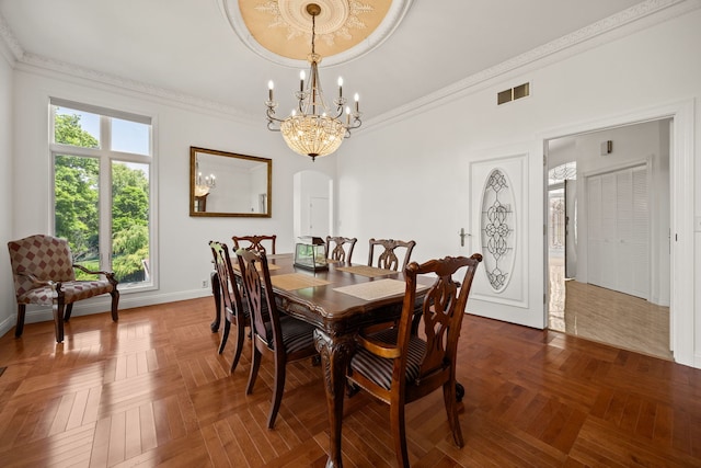 W3318 Lake Forest Ln, Lake Geneva, WI 53147 - dining space featuring arched walkways, a chandelier, and ornamental molding