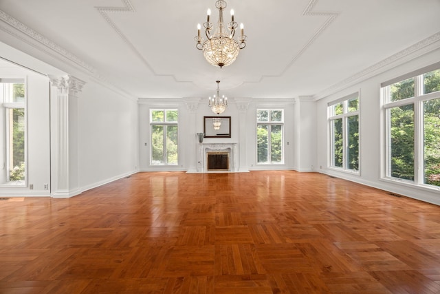 W3318 Lake Forest Ln, Lake Geneva, WI 53147 - unfurnished living room featuring a chandelier and a premium fireplace