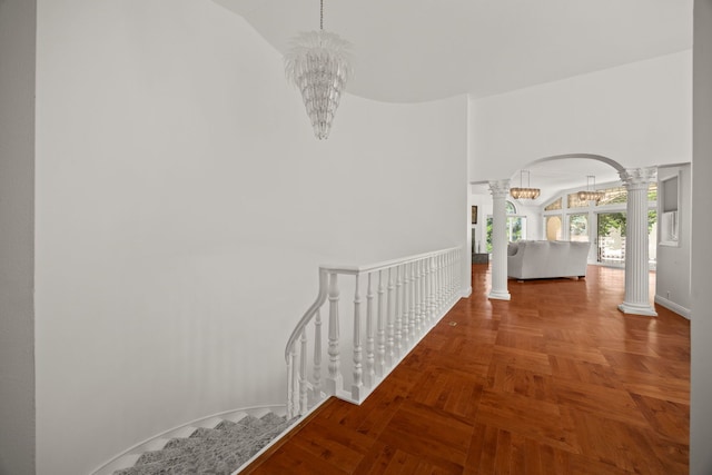 W3318 Lake Forest Ln, Lake Geneva, WI 53147 - corridor featuring decorative columns, arched walkways, a chandelier, and high vaulted ceiling