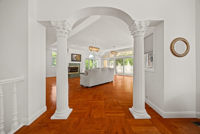 W3318 Lake Forest Ln, Lake Geneva, WI 53147 - hallway with decorative columns and plenty of natural light