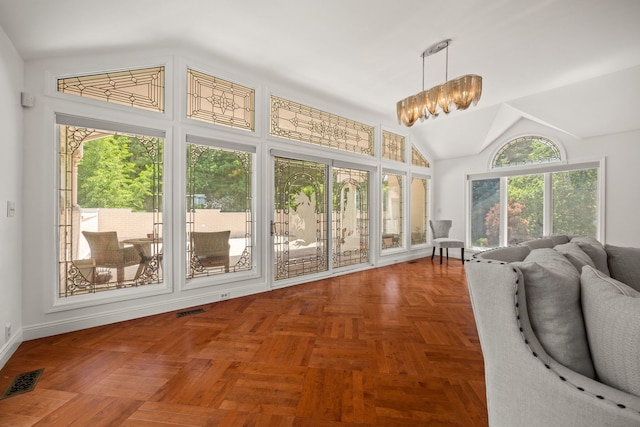 W3318 Lake Forest Ln, Lake Geneva, WI 53147 - sunroom / solarium with healthy amount of natural light, a chandelier, and vaulted ceiling