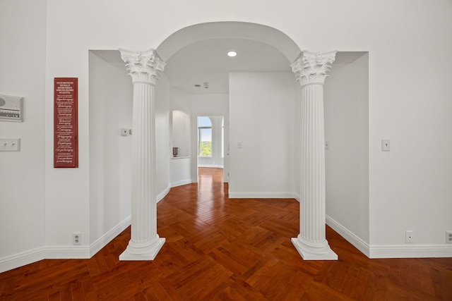 W3318 Lake Forest Ln, Lake Geneva, WI 53147 - hall featuring ornate columns, arched walkways, and recessed lighting