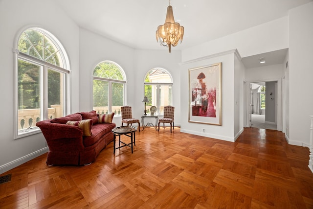W3318 Lake Forest Ln, Lake Geneva, WI 53147 - living area featuring a chandelier and baseboards