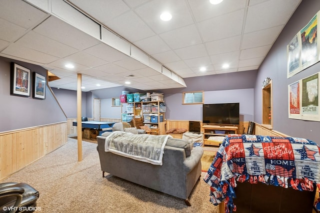 462 Kelly Ln, Crystal Lake, IL 60012 - carpeted living room featuring a wainscoted wall, a paneled ceiling, and wooden walls