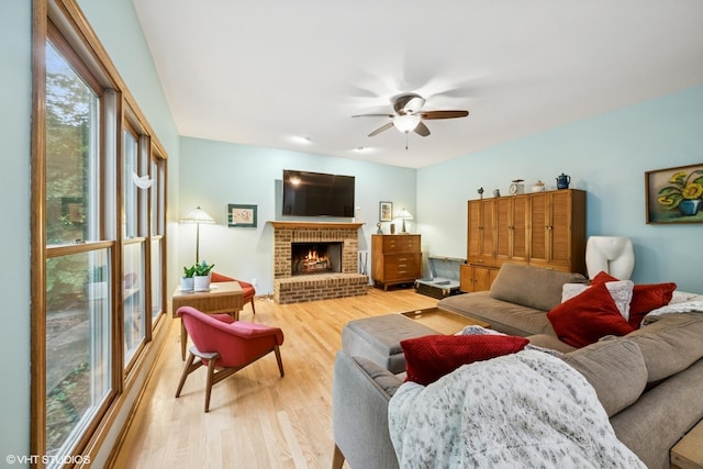 462 Kelly Ln, Crystal Lake, IL 60012 - living room featuring ceiling fan, light wood-style flooring, and a brick fireplace