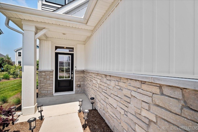 4116 Chelsea Manor Cir, Aurora, IL 60504 - doorway to property with stone siding and board and batten siding