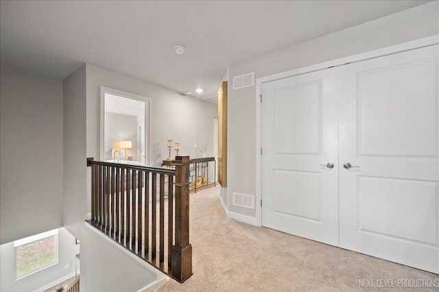 4116 Chelsea Manor Cir, Aurora, IL 60504 - hall with an upstairs landing, light colored carpet, and recessed lighting