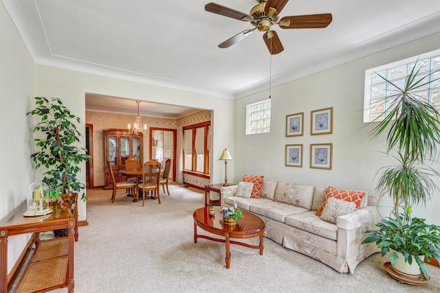 5143 N Monitor Ave, Chicago, IL 60630 - carpeted living area with a chandelier, ornamental molding, and ceiling fan
