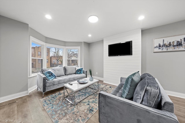 5241 W Adams St, Chicago, IL 60644 - living room featuring wood finished floors and recessed lighting