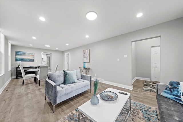 5241 W Adams St, Chicago, IL 60644 - living area with light wood-style flooring and recessed lighting