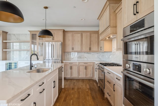 kitchen featuring stainless steel appliances, light brown cabinets, beverage cooler, tasteful backsplash, and hanging light fixtures