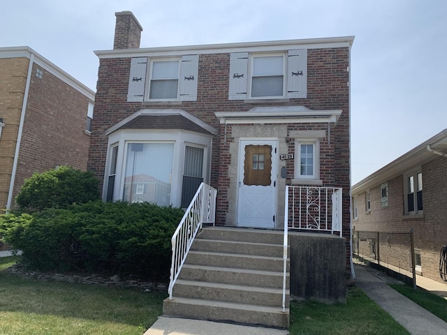 4520 N Austin Ave, Chicago, IL 60630 - view of front of house with brick siding and a chimney