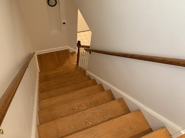 4520 N Austin Ave, Chicago, IL 60630 - staircase with wood finished floors and baseboards