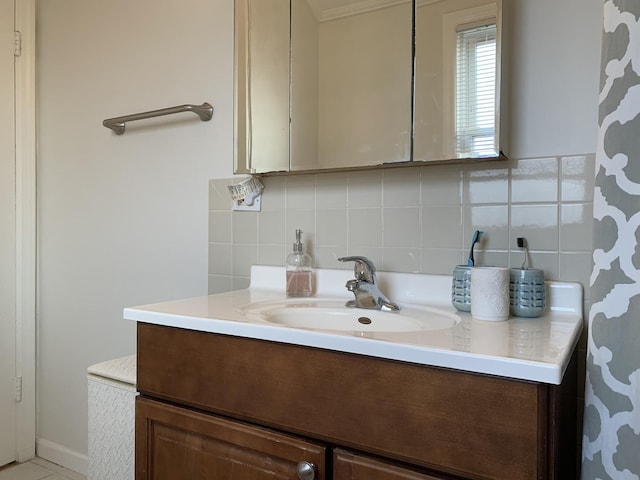 4520 N Austin Ave, Chicago, IL 60630 - bathroom featuring vanity and decorative backsplash
