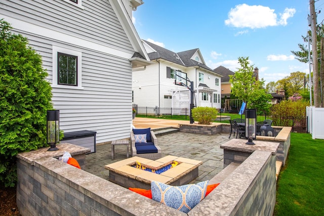 33 N Fremont St, Naperville, IL 60540 - fenced backyard featuring a fire pit, a patio, and a residential view