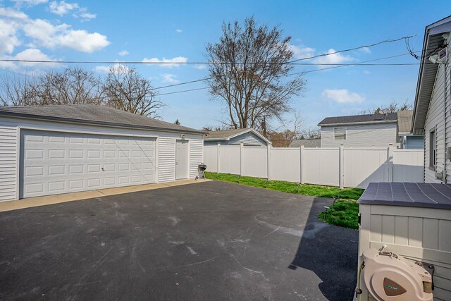 324 N Prospect Dr, Round Lake Park, IL 60073 - view of patio / terrace featuring an outdoor structure and a garage