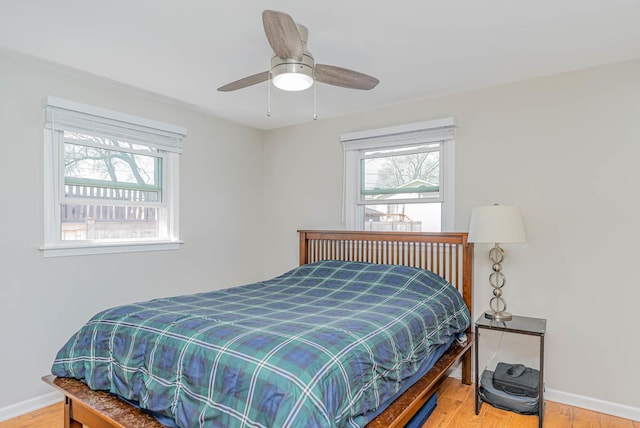 324 N Prospect Dr, Round Lake Park, IL 60073 - bedroom with wood finished floors and a ceiling fan