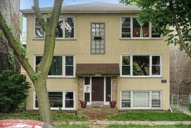 4030 N Mozart St Unit 3N, Chicago, IL 60618 - view of front facade featuring brick siding