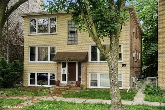 4030 N Mozart St Unit 3N, Chicago, IL 60618 - view of front facade featuring brick siding