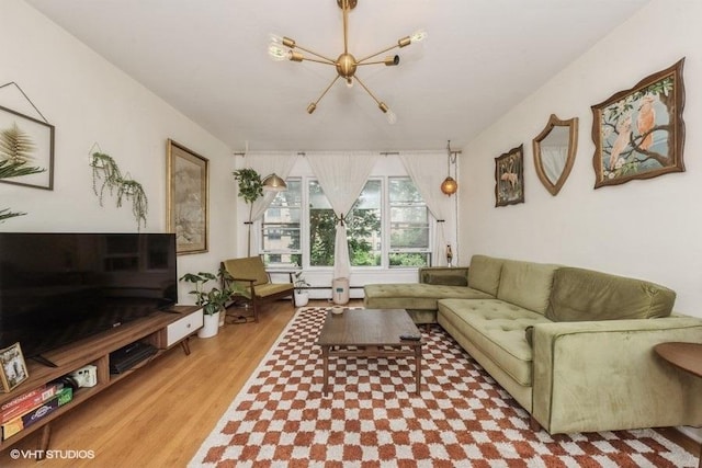 4030 N Mozart St Unit 3N, Chicago, IL 60618 - living area featuring a chandelier and wood finished floors