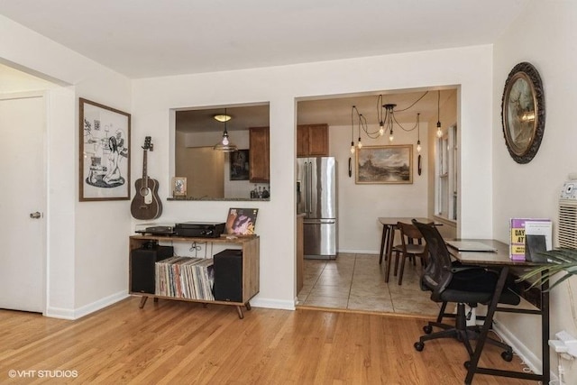4030 N Mozart St Unit 3N, Chicago, IL 60618 - kitchen with stainless steel refrigerator with ice dispenser, wood finished floors, and a chandelier