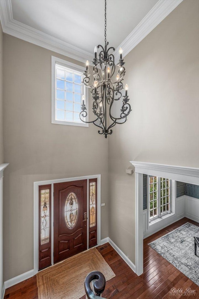 0S400 Crego Pl, Geneva, IL 60134 - foyer entrance featuring a chandelier, wood finished floors, ornamental molding, plenty of natural light, and a towering ceiling