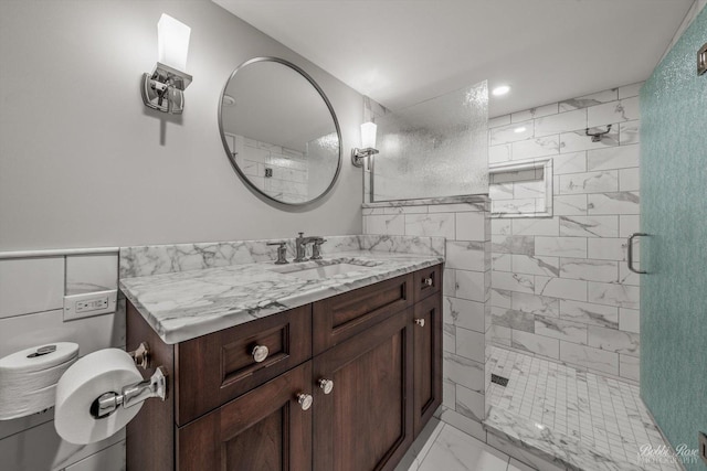 0S400 Crego Pl, Geneva, IL 60134 - full bath featuring a stall shower, vanity, tile walls, marble look tile flooring, and recessed lighting