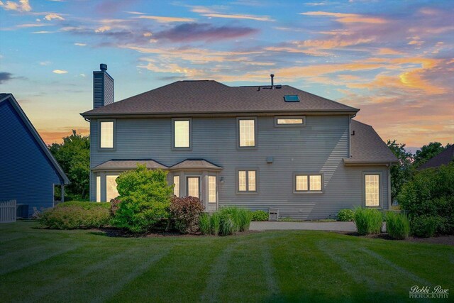 0S400 Crego Pl, Geneva, IL 60134 - rear view of house featuring a lawn, a chimney, and a shingled roof
