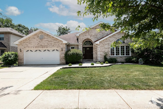 1196 Covington Dr, Lemont, IL 60439 - view of front facade featuring brick siding, a garage, a front yard, and driveway