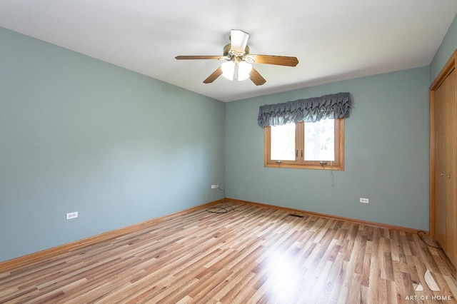 1196 Covington Dr, Lemont, IL 60439 - empty room featuring light wood-type flooring and ceiling fan