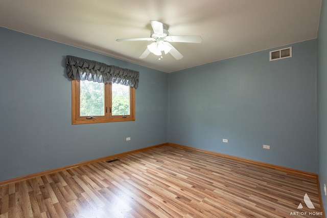 1196 Covington Dr, Lemont, IL 60439 - unfurnished room with wood finished floors and ceiling fan