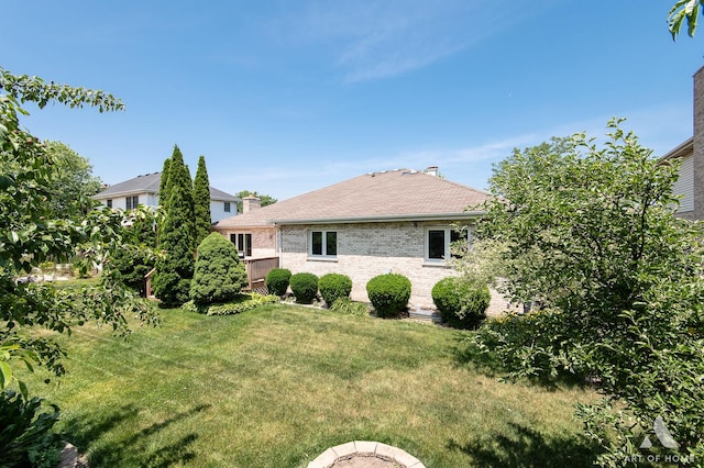 1196 Covington Dr, Lemont, IL 60439 - back of property with brick siding, a yard, and roof with shingles
